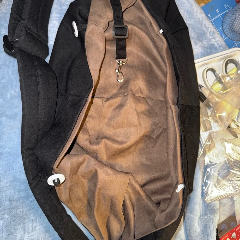 Black / Tan Pet Sling crossbody style carrier with extra padded strap. Travel